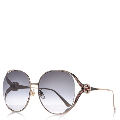 gucci round sunglasses gold.